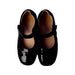 A Black Flats from Dr. Kong in size 7Y for girl. (Back View)