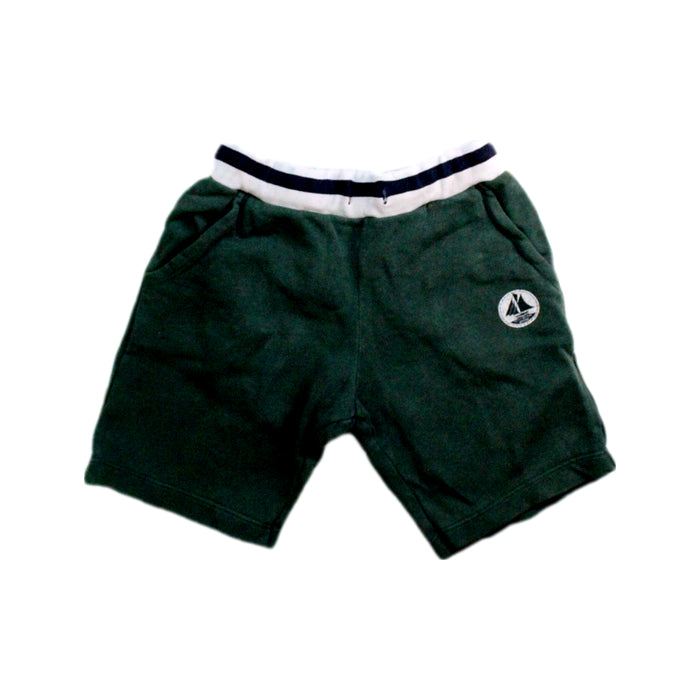 A Green Shorts from Petit Bateau in size 5T for boy. (Front View)