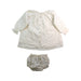 A White Dress Sets from Nanos in size 6-12M for girl. (Back View)