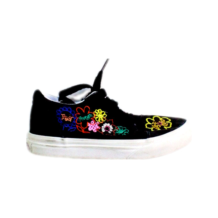 A Black Sneakers from Vans in size 5T for girl. (Front View)
