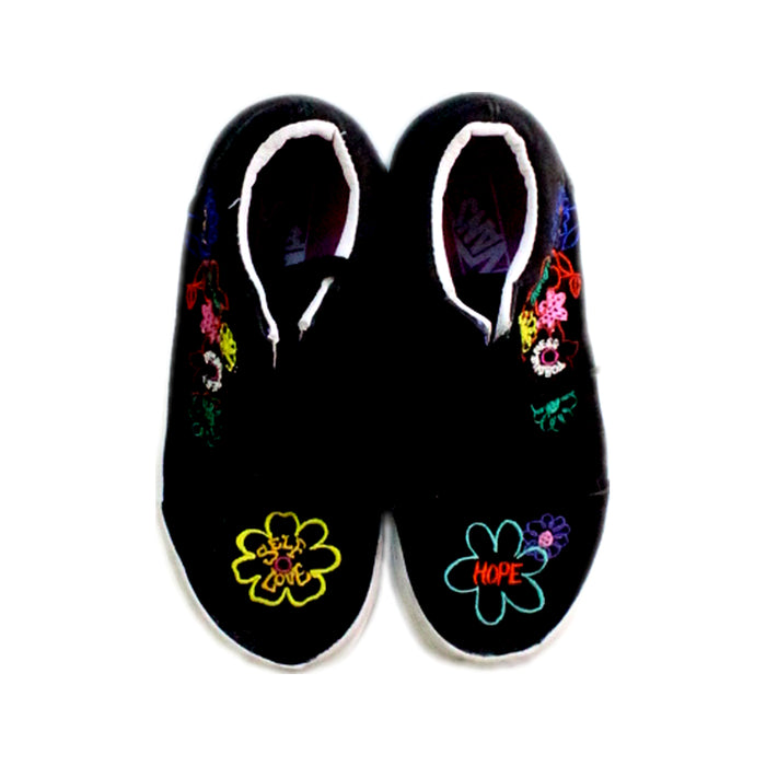 A Black Sneakers from Vans in size 5T for girl. (Back View)