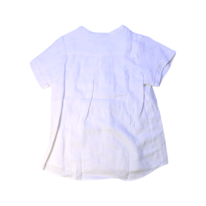 A White Short Sleeve Shirts from Nanos in size 8Y for boy. (Back View)