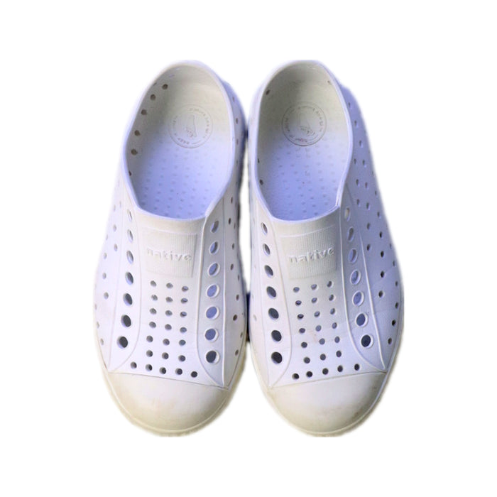 A White Sneakers from Crocs in size 4T for neutral. (Back View)