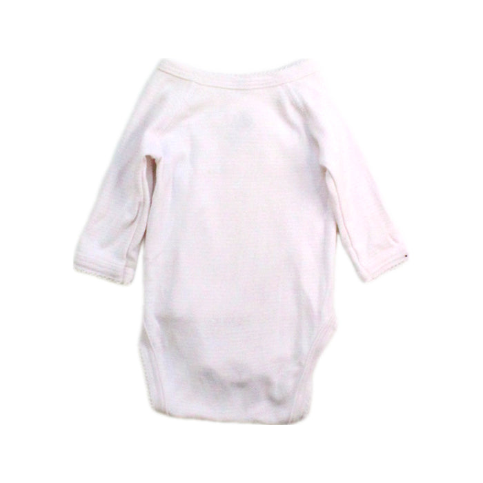 A White Long Sleeve Bodysuits from Petit Bateau in size Newborn for girl. (Back View)