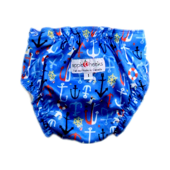 A Blue Swim Diapers from Apple Cheeks in size 12-18M for boy. (Back View)
