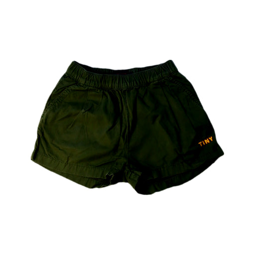 A Green Shorts from Tinycottons in size 6T for neutral. (Front View)
