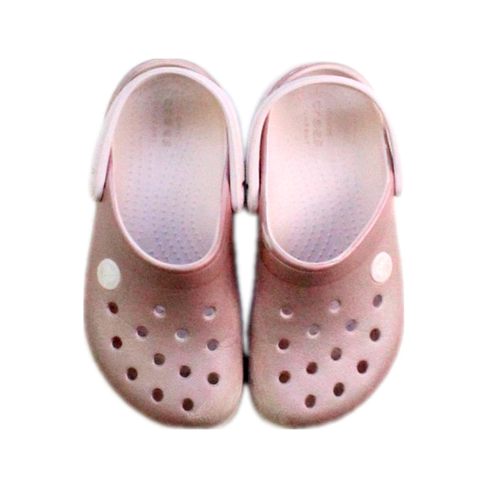 A Pink Slip Ons from Crocs in size 4T for girl. (Back View)