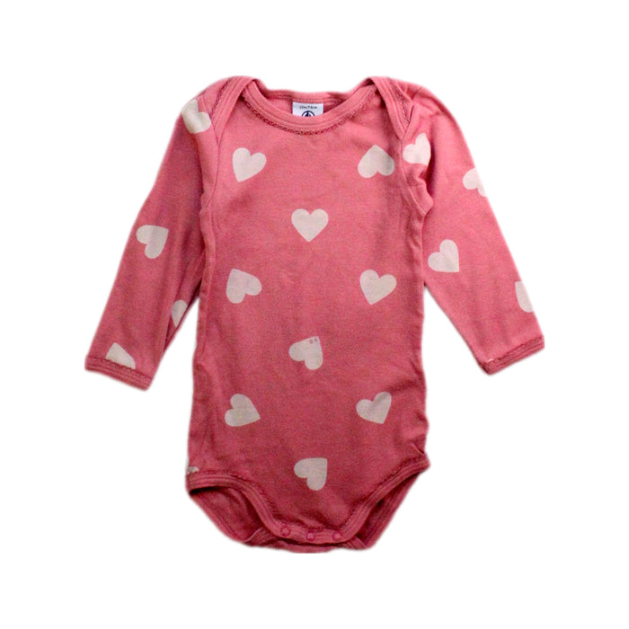 A Pink Long Sleeve Bodysuits from Petit Bateau in size 6-12M for girl. (Front View)