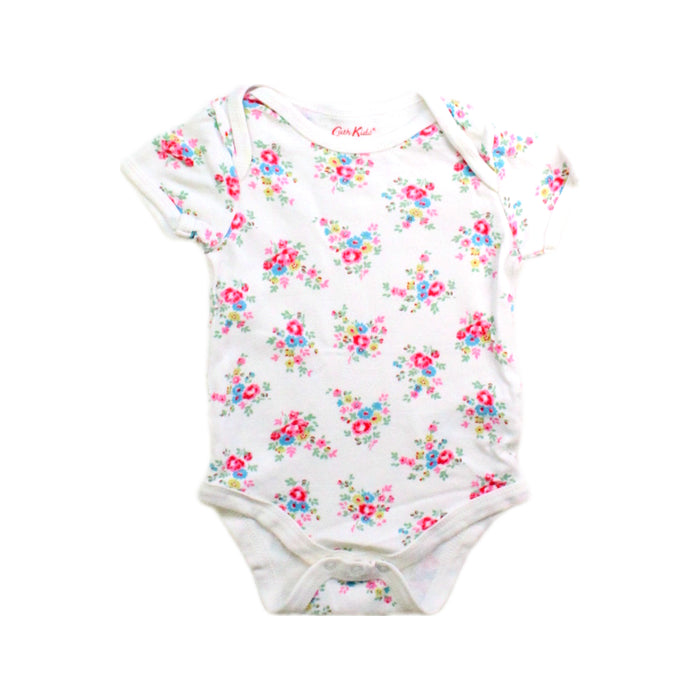 A White Short Sleeve Bodysuits from Cath Kids London in size 3-6M for girl. (Front View)