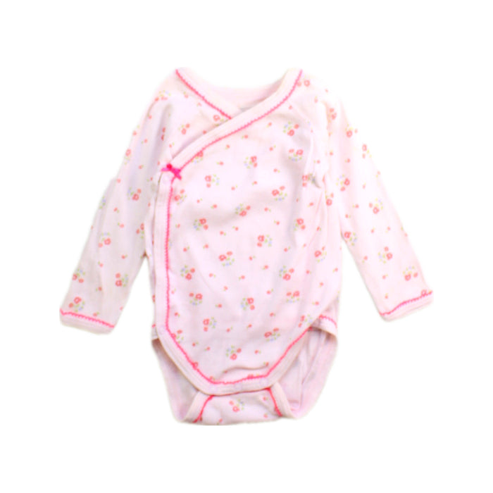 A Pink Long Sleeve Bodysuits from Petit Bateau in size 3-6M for girl. (Front View)
