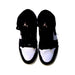 A Black Sneakers from Air Jordan in size 14Y for neutral. (Back View)