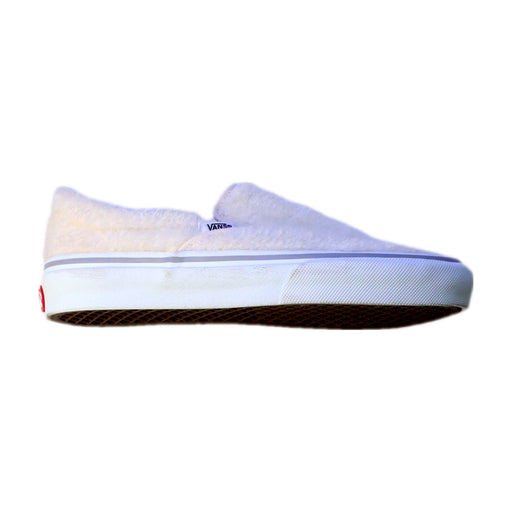 A White Slip Ons from Vans in size 12Y for girl. (Front View)
