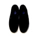 A Black Slip Ons from Vans in size 12Y for girl. (Back View)