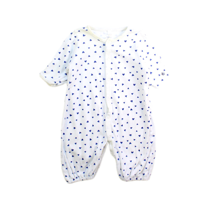 A White Short Sleeve Rompers from Petit Bateau in size Newborn for boy. (Front View)