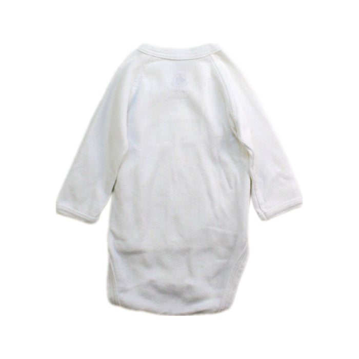 A White Long Sleeve Bodysuits from Petit Bateau in size Newborn for boy. (Back View)