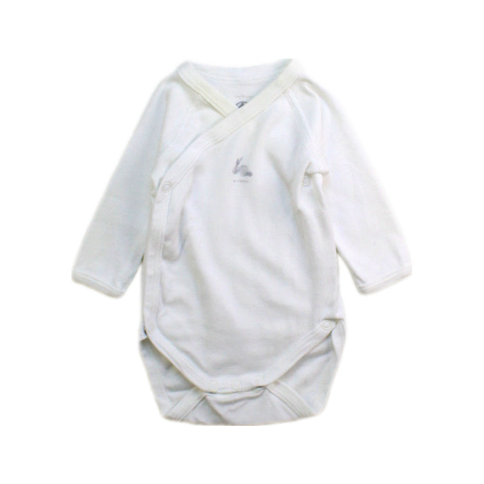 A White Long Sleeve Bodysuits from Petit Bateau in size Newborn for neutral. (Front View)