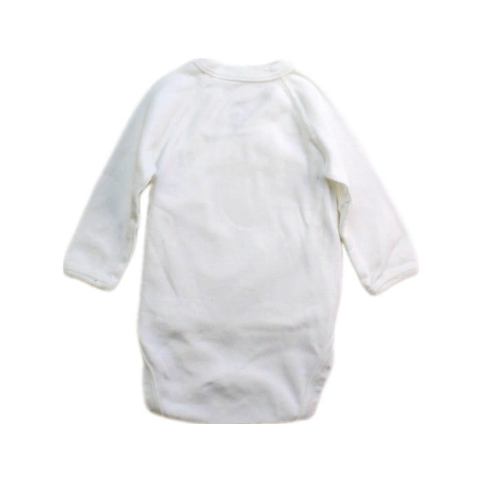 A White Long Sleeve Bodysuits from Petit Bateau in size Newborn for neutral. (Back View)
