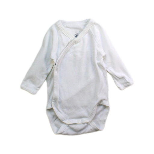 A White Long Sleeve Bodysuits from Petit Bateau in size Newborn for neutral. (Front View)