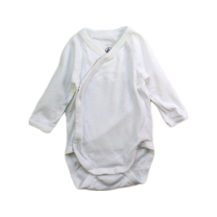 A White Long Sleeve Bodysuits from Petit Bateau in size Newborn for neutral. (Front View)