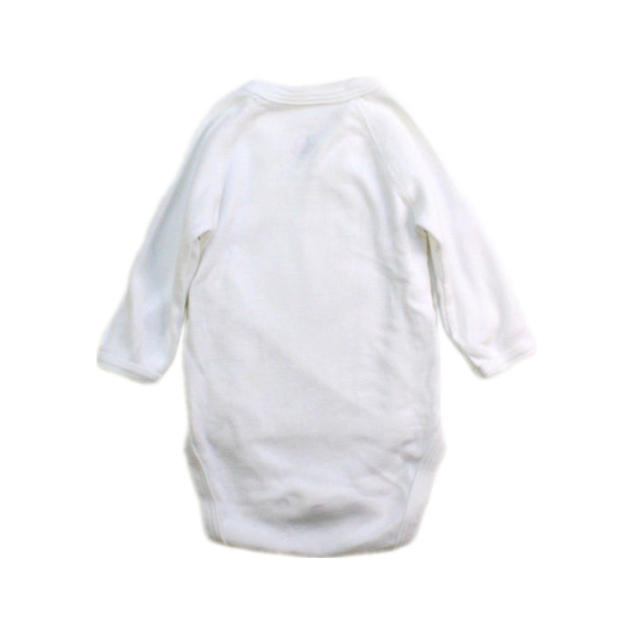 A White Long Sleeve Bodysuits from Petit Bateau in size Newborn for neutral. (Back View)