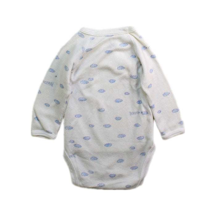 A White Long Sleeve Bodysuits from Petit Bateau in size Newborn for boy. (Back View)