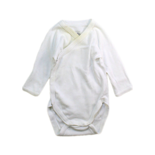 A White Long Sleeve Bodysuits from Petit Bateau in size Newborn for neutral. (Front View)