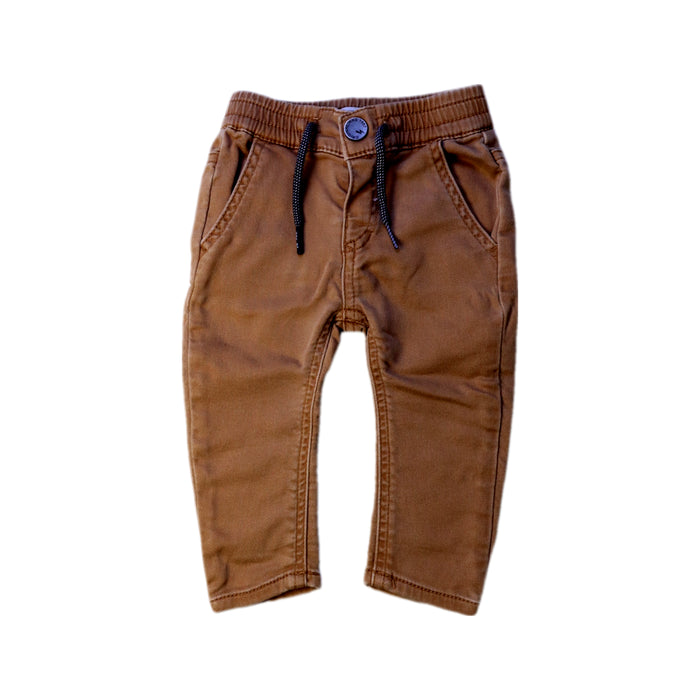 A Brown Casual Pants from IKKS in size 3-6M for boy. (Front View)