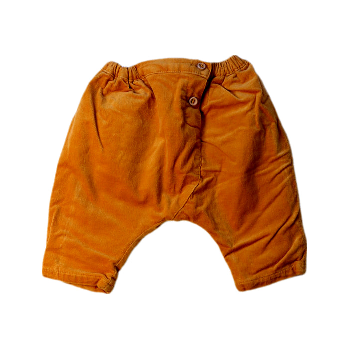 A Orange Casual Pants from Bout'Chou in size 0-3M for girl. (Front View)
