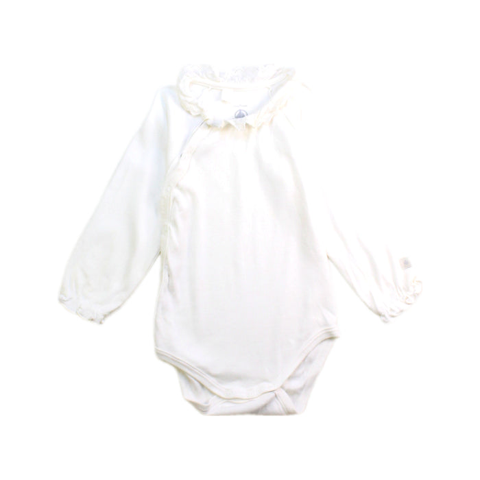 A Ivory Long Sleeve Bodysuits from Petit Bateau in size 6-12M for girl. (Front View)