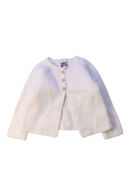 A Ivory Cardigans from Bonton in size 6-12M for girl. (Front View)