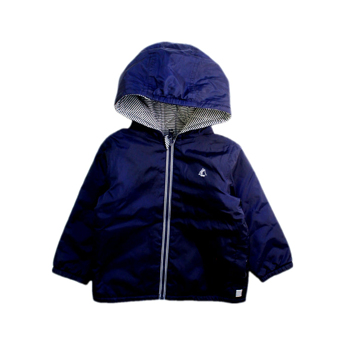 A Navy Rain Jackets from Petit Bateau in size 12-18M for boy. (Front View)