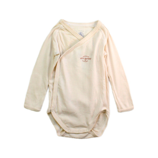 A Ivory Long Sleeve Bodysuits from Petit Bateau in size 6-12M for neutral. (Front View)