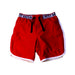 A Red Shorts from Petit Bateau in size 5T for neutral. (Front View)