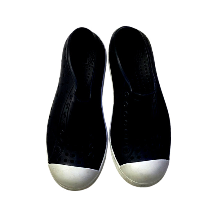 A Black Slip Ons from Native Shoes in size 6T for boy. (Back View)