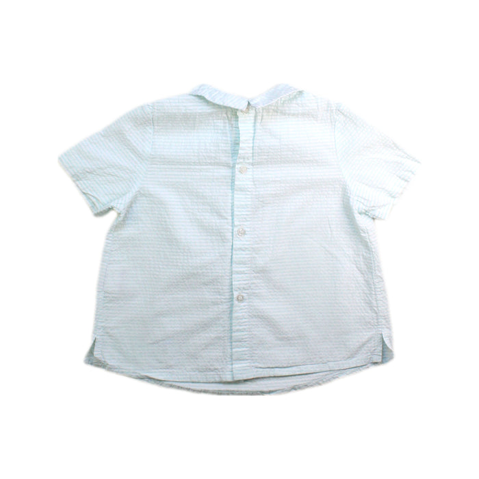 A Blue Short Sleeve Shirts from Fina Ejerique in size 2T for girl. (Back View)