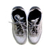 A Grey Sneakers from Air Jordan in size 11Y for boy. (Back View)