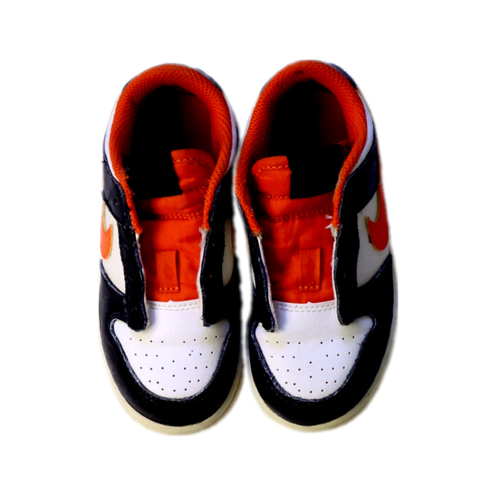 A Black Sneakers from Nike in size 4T for boy. (Back View)
