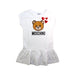 A White Short Sleeve Dresses from Moschino in size 4T for girl. (Front View)