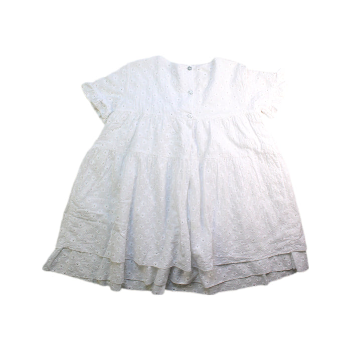 A White Short Sleeve Dresses from Nanos in size 5T for girl. (Back View)