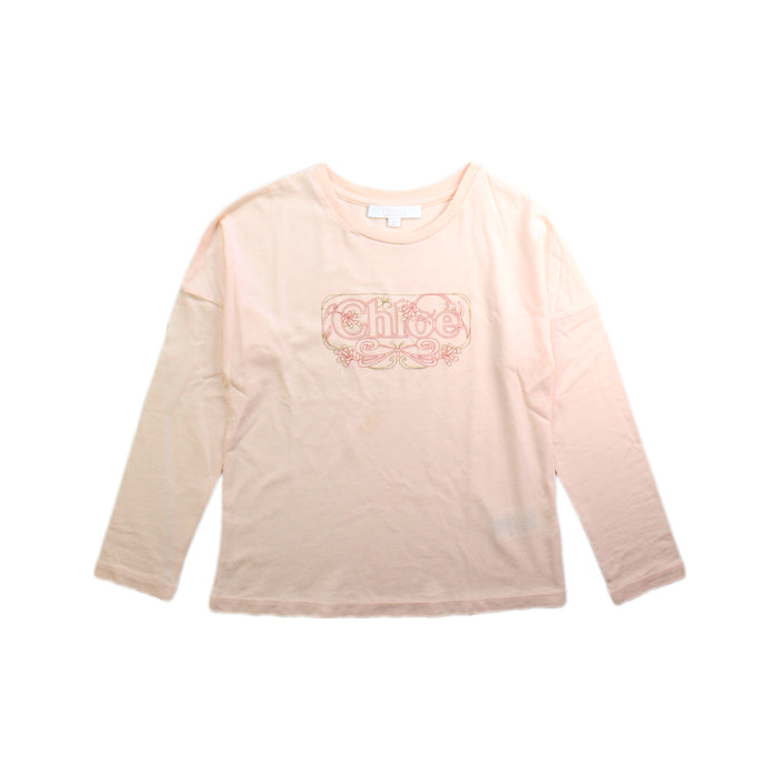 A Pink Long Sleeve Tops from Chloe in size 6T for girl. (Front View)