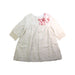A Ivory Long Sleeve Dresses from Nanos in size 6T for girl. (Front View)