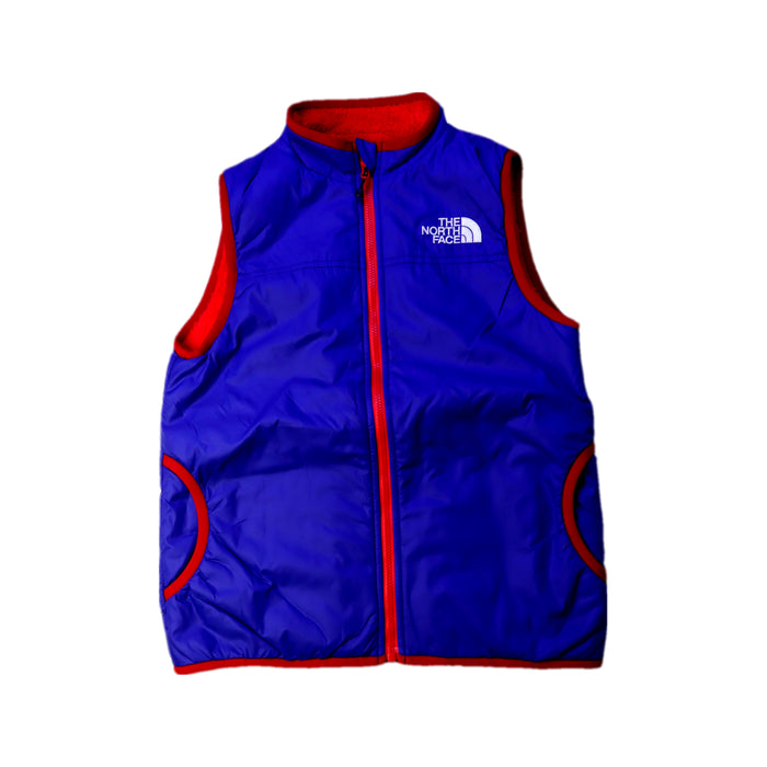 A Blue Outerwear Vests from The North Face in size 7Y for neutral. (Front View)