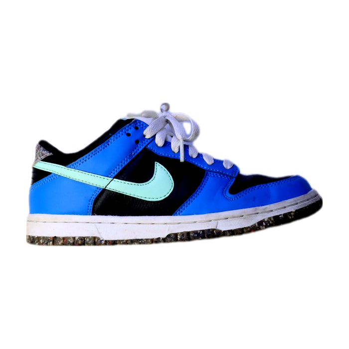 A Blue Sneakers from Nike in size 11Y for boy. (Front View)