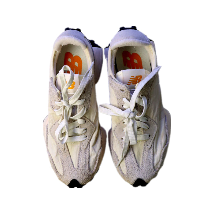 A White Sneakers from New Balance in size 11Y for neutral. (Back View)