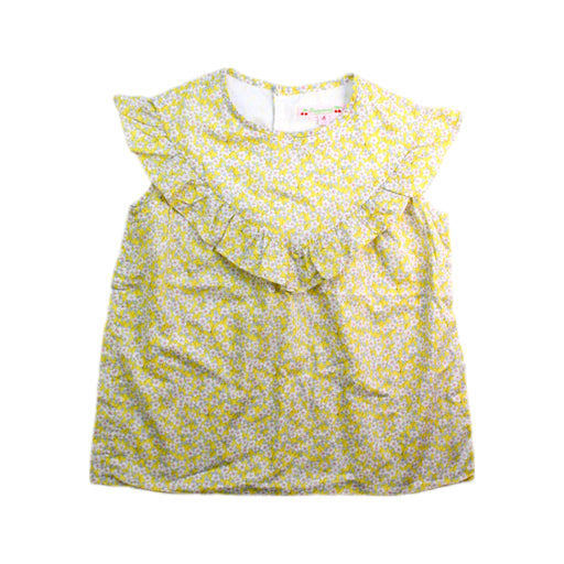 A Yellow Sleeveless Tops from Bonpoint in size 4T for girl. (Front View)