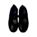 A Black Flats from Geox in size 5T for girl. (Back View)