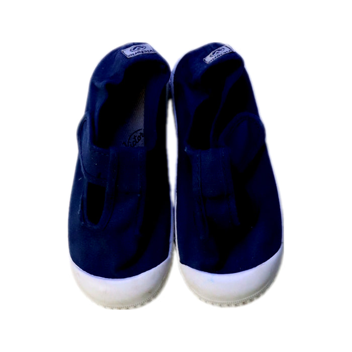 A Navy Flats from Victoria in size 4T for neutral. (Back View)