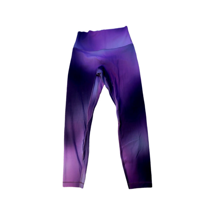 A Purple Leggings from Lululemon in size 14Y for girl. (Front View)