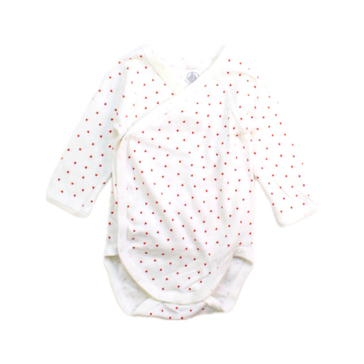 A White Long Sleeve Bodysuits from Petit Bateau in size 0-3M for girl. (Front View)