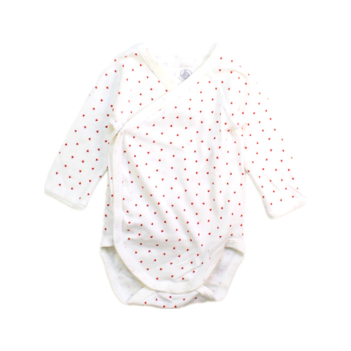 A White Long Sleeve Bodysuits from Petit Bateau in size 0-3M for girl. (Front View)